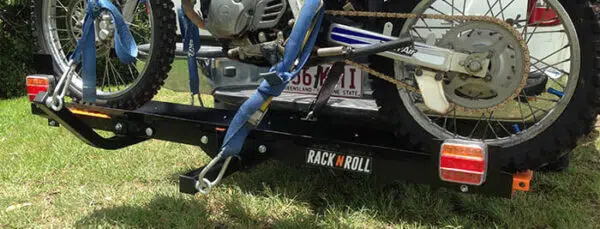 Rack N Roll's mini motorcycle carrier connected to ute and bike loaded