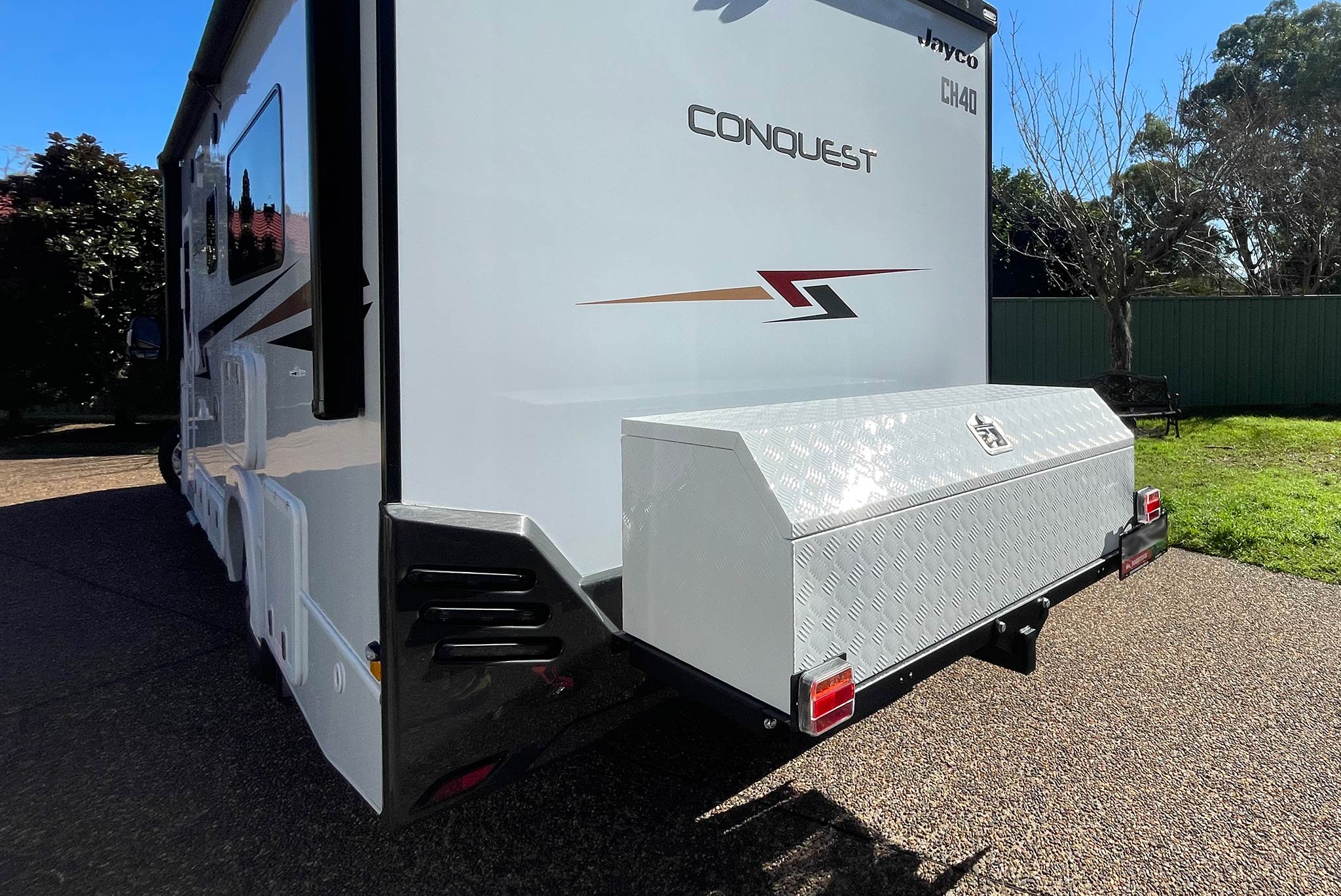 Rack N Roll Motorhome towbar receiver mounted storage base holding a checkerplate toolbox